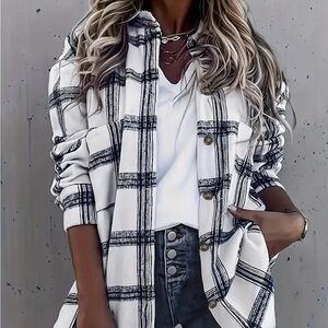 Brand New women's oversized plaid shirt size Large PTP 22 inches Length 31 in